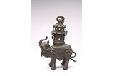A BRONZE PAGODA SUPPORTING ELEPHANT