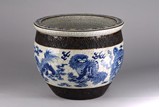 A BLUE AND WHITE 'BUDDHIST LIONS' JARDINIERE