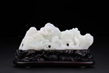 A WHITE JADE 'DRAGON AND MOUNTAIN' BRUSHREST