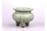 A SMALL LONGQUAN CELADON TRIPOD CENSER